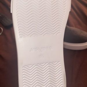 New never worn J/Slides - 8.5